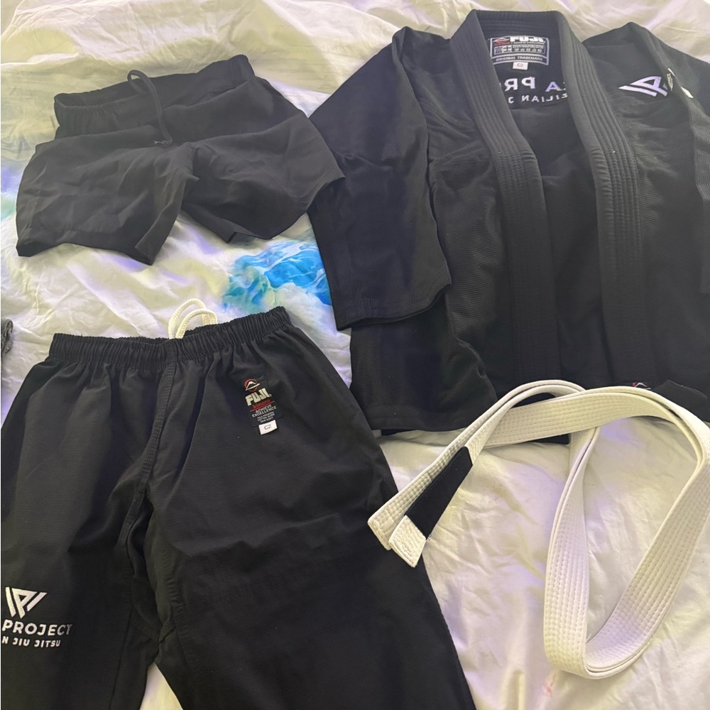 Never worn Black Martial Arts Gi with White Belt